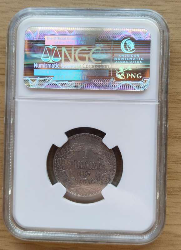 ZAR Paul Kruger 1897 NGC AU55 Silver Shilling.