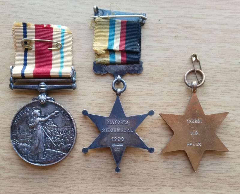 Boer War And Kimberly Star Defence of Kimberly Group Medals Awarded to MR. J. HEADS POST OFFICE CORP