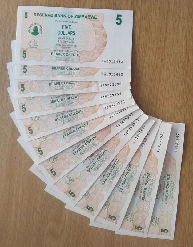 Zimbabwe Collection of 12 X  5 Dollar Bearer Cheques.