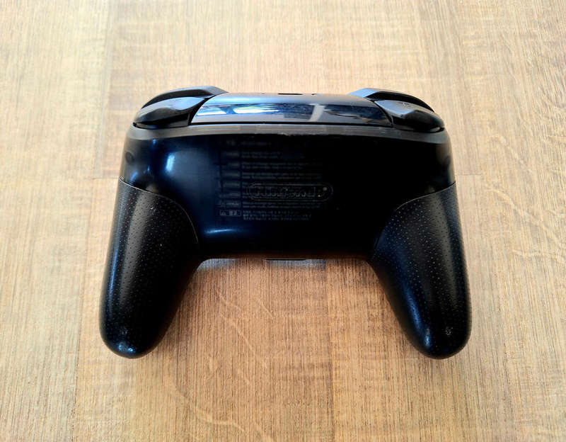 Nintendo Switch OLED Console with Pro Controller + Case