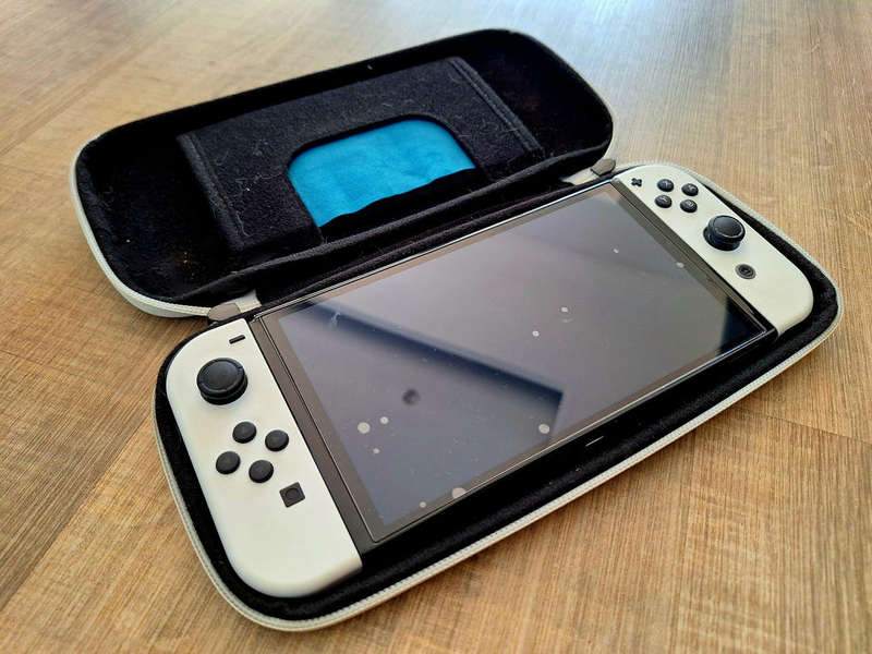 Nintendo Switch OLED Console with Pro Controller + Case