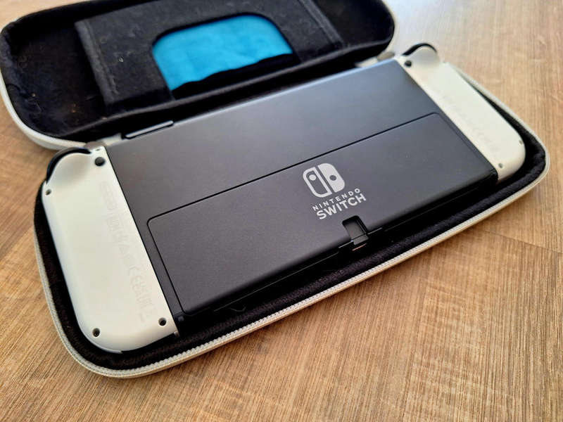 Nintendo Switch OLED Console with Pro Controller + Case