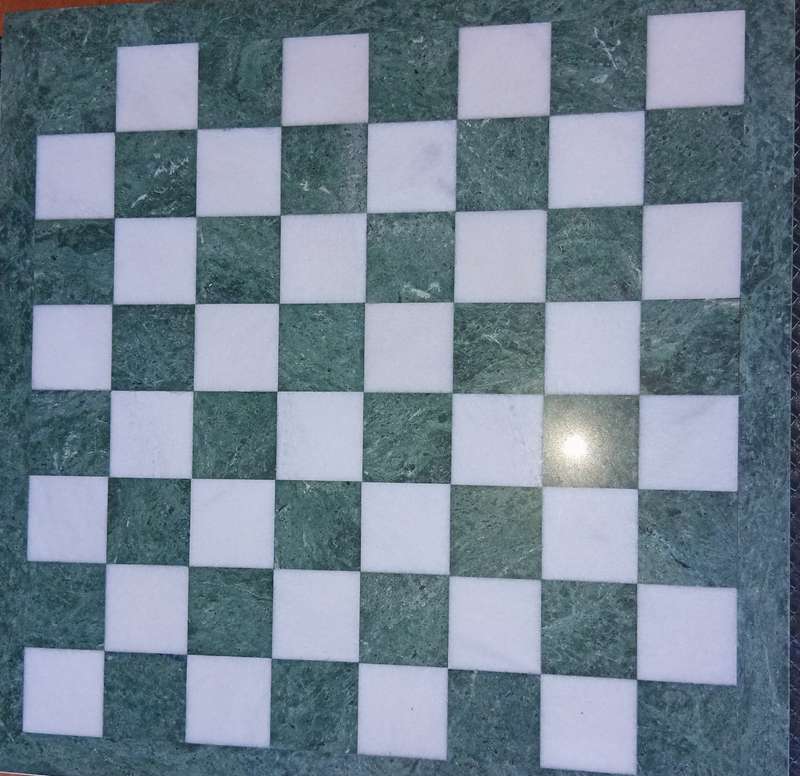 Italian marble chess board with metal medieval pieces. Beautiful.