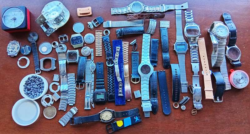 AMAZING WATCH MAKERS COLLECTION OF WATCH MOVEMENTS, BELTS,BRACELETS AND FACES