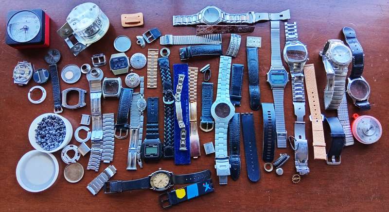 AMAZING WATCH MAKERS COLLECTION OF WATCH MOVEMENTS, BELTS,BRACELETS AND FACES