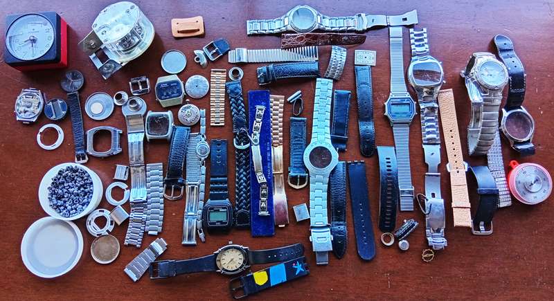 AMAZING WATCH MAKERS COLLECTION OF WATCH MOVEMENTS, BELTS,BRACELETS AND FACES