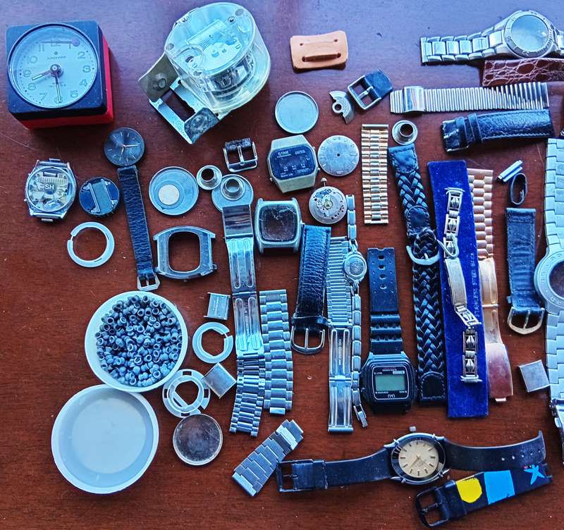 AMAZING WATCH MAKERS COLLECTION OF WATCH MOVEMENTS, BELTS,BRACELETS AND FACES