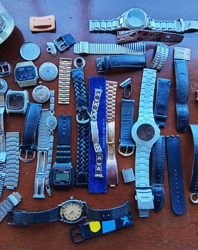 AMAZING WATCH MAKERS COLLECTION OF WATCH MOVEMENTS, BELTS,BRACELETS AND FACES