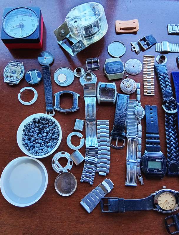 AMAZING WATCH MAKERS COLLECTION OF WATCH MOVEMENTS, BELTS,BRACELETS AND FACES