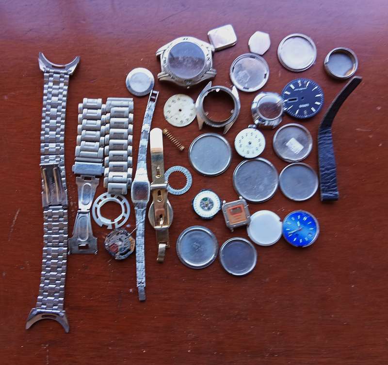 AMAZING WATCH MAKERS COLLECTION OF WATCH MOVEMENTS, BELTS,BRACELETS AND FACES