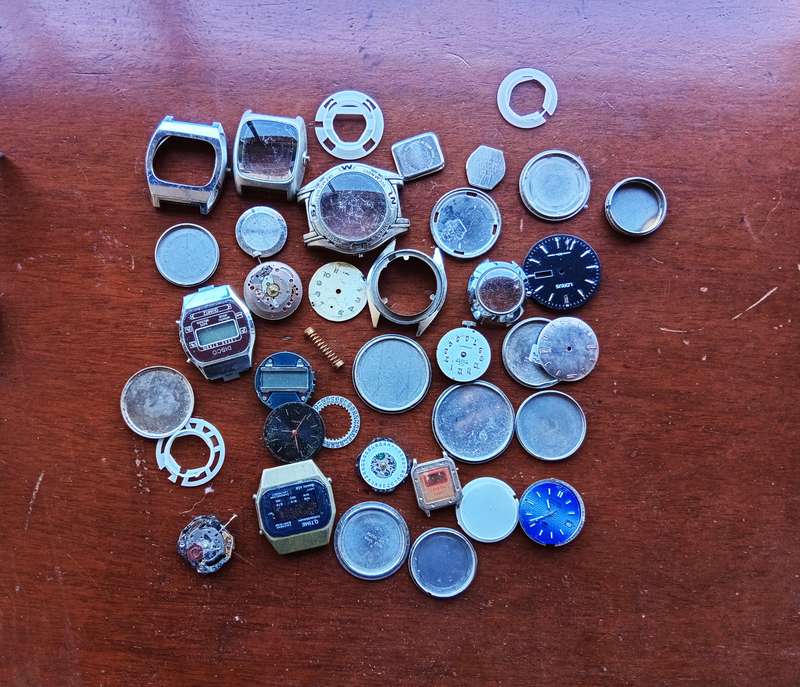 AMAZING WATCH MAKERS COLLECTION OF WATCH MOVEMENTS, BELTS,BRACELETS AND FACES