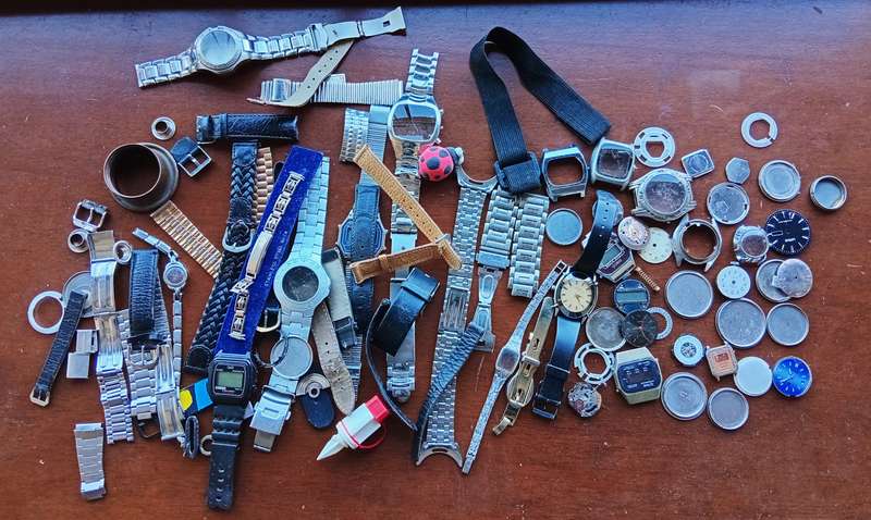 AMAZING WATCH MAKERS COLLECTION OF WATCH MOVEMENTS, BELTS,BRACELETS AND FACES