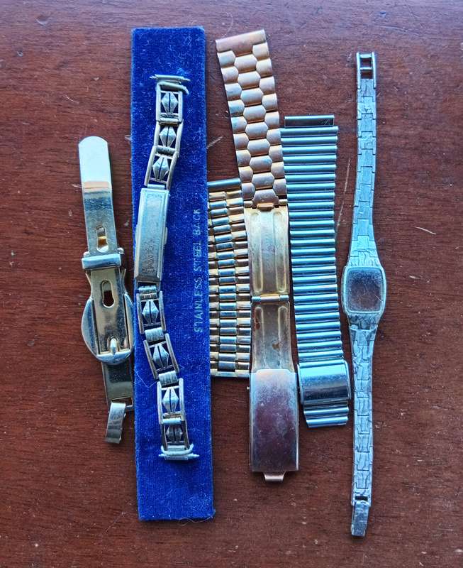 AMAZING WATCH MAKERS COLLECTION OF WATCH MOVEMENTS, BELTS,BRACELETS AND FACES