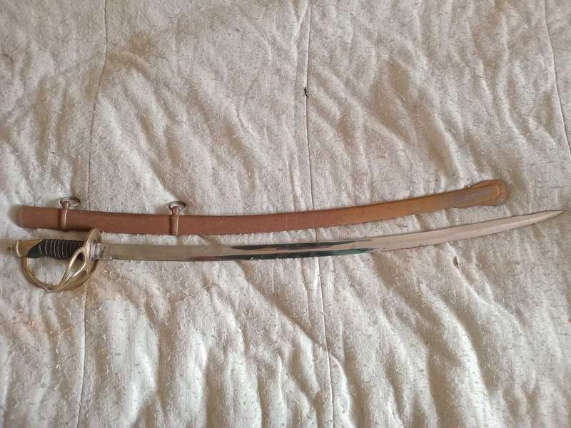 Original Antique cavalry Sabre swordEngraved the word "India" at base of blade, from 1800s