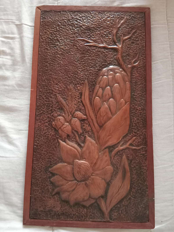 Protea on copper relief in wood display