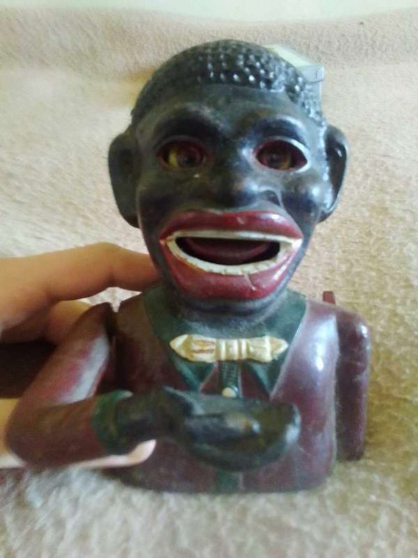 Rare antique American cast iron money bank with lever arm control for coin insertion