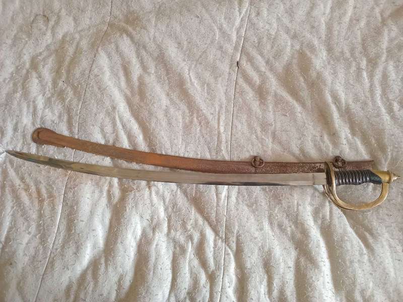 Original Antique cavalry Sabre swordEngraved the word "India" at base of blade, from 1800s