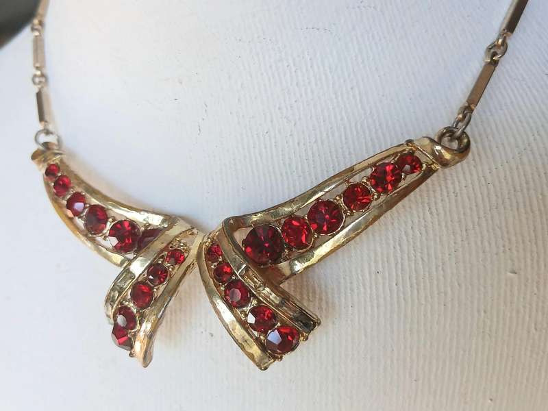 Vintage Gold Tone and Ruby Red Rhinestone Bow Pendant Necklace by Coro