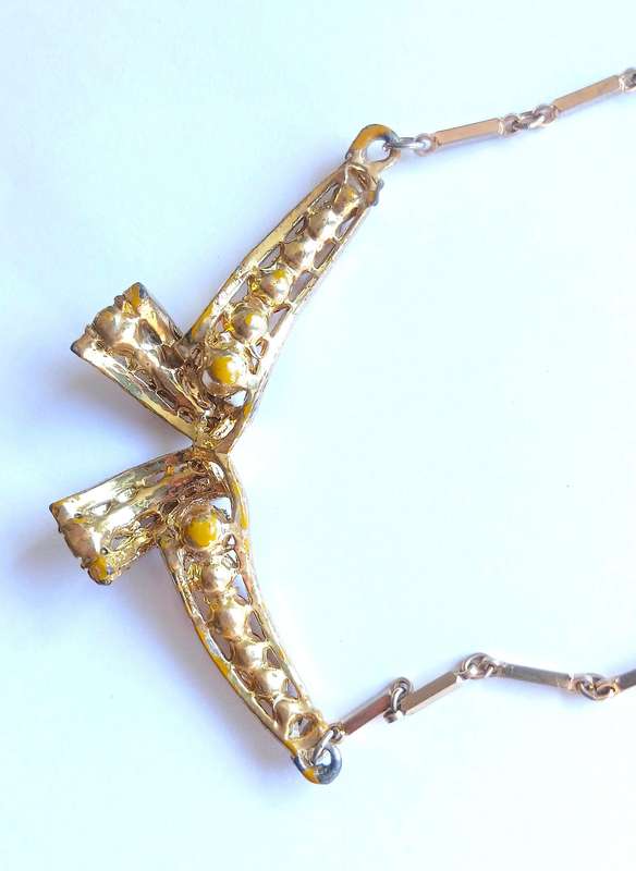 Vintage Gold Tone and Ruby Red Rhinestone Bow Pendant Necklace by Coro