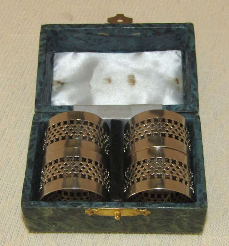 Vintage Boxed Set of Four Silver-tone Pierced Metal Napkin Rings