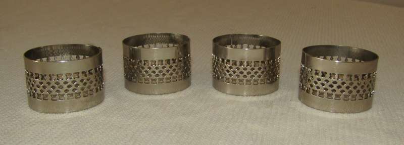 Vintage Boxed Set of Four Silver-tone Pierced Metal Napkin Rings