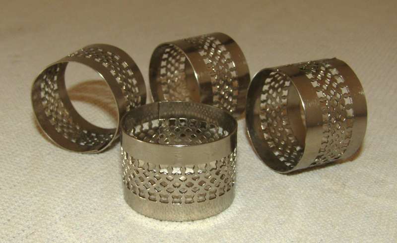Vintage Boxed Set of Four Silver-tone Pierced Metal Napkin Rings