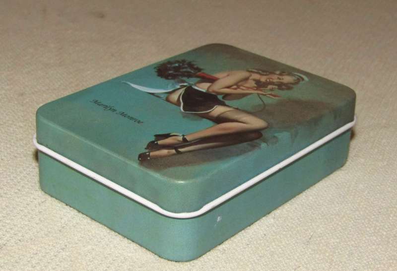 Contemporary Collectible Small Turquoise Storage Tin Featuring Marilyn Monroe - Pin-Up Style