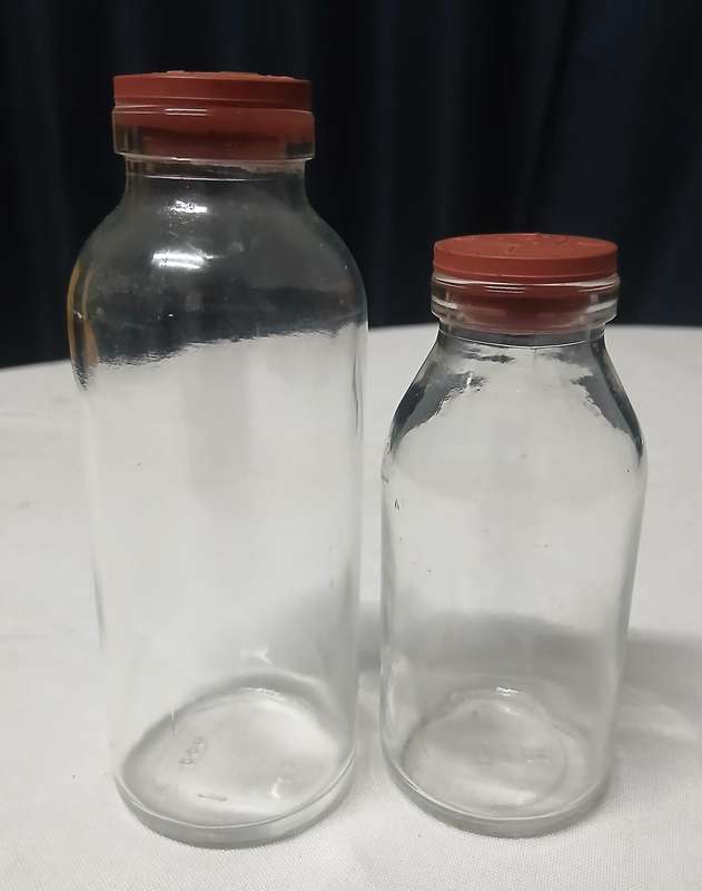 Pair of Vintage Apothecary Bottles | Clear Glass with Rubber Stoppers | Mid-Century Medical Style