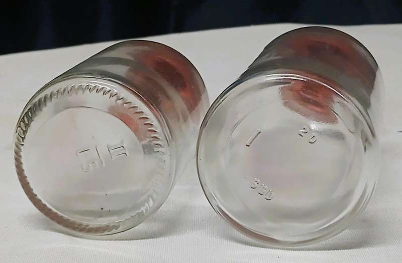 Pair of Vintage Apothecary Bottles | Clear Glass with Rubber Stoppers | Mid-Century Medical Style
