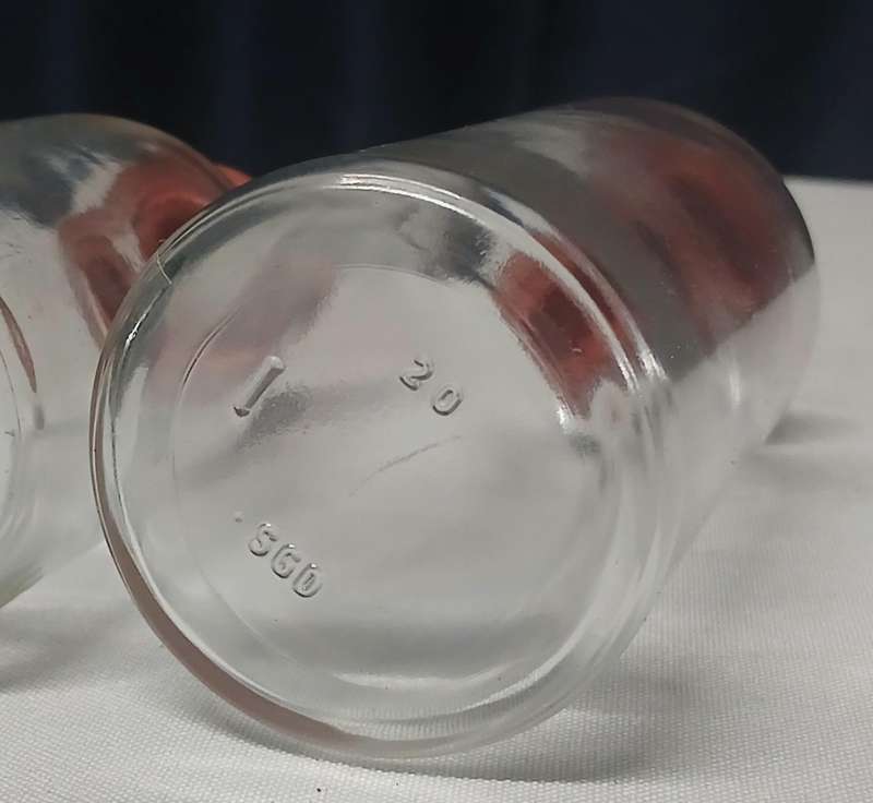 Pair of Vintage Apothecary Bottles | Clear Glass with Rubber Stoppers | Mid-Century Medical Style