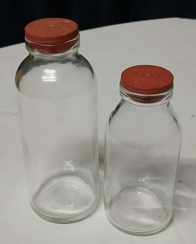 Pair of Vintage Apothecary Bottles | Clear Glass with Rubber Stoppers | Mid-Century Medical Style