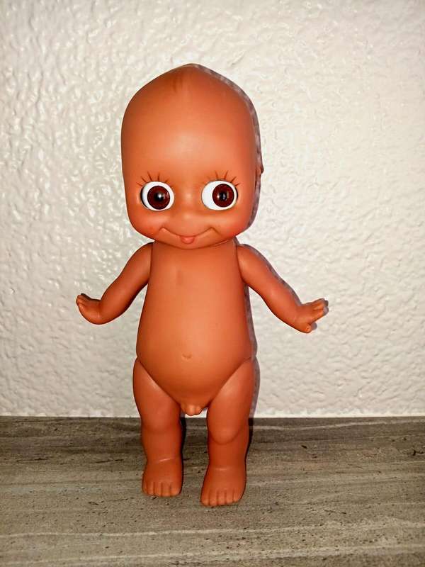 Kewpie doll, anatomically correct male, with googly eyes
