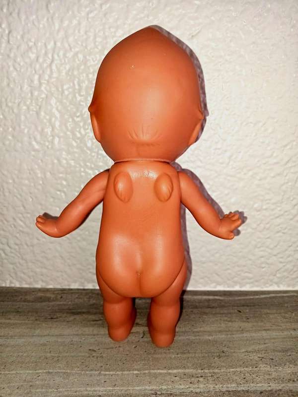Kewpie doll, anatomically correct male, with googly eyes