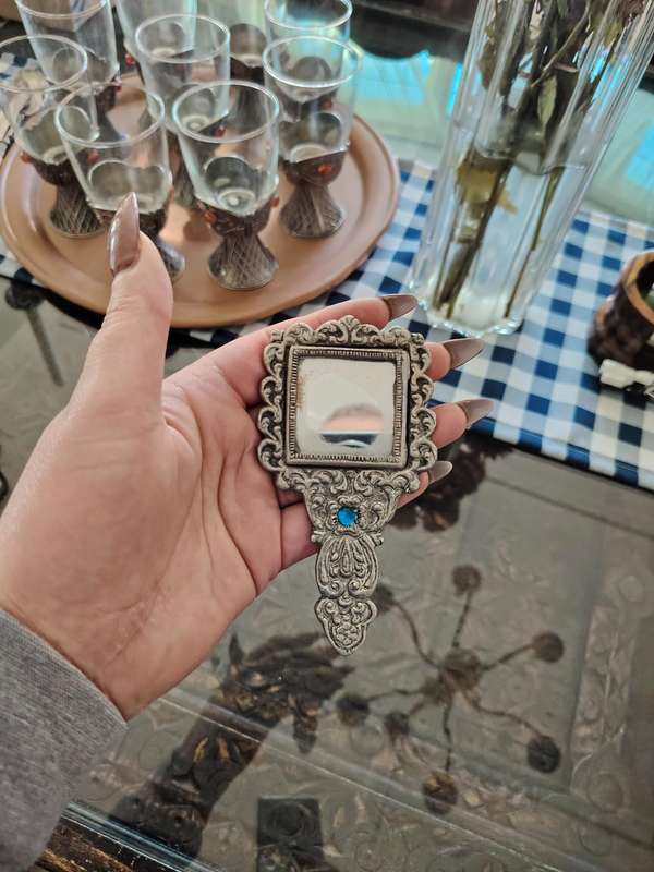 Beautiful vintage ornate hand held mirror