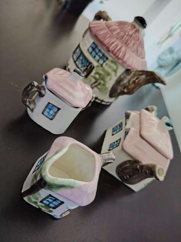 Beautiful ceramic handpainted teapots and sugar & milk jugs