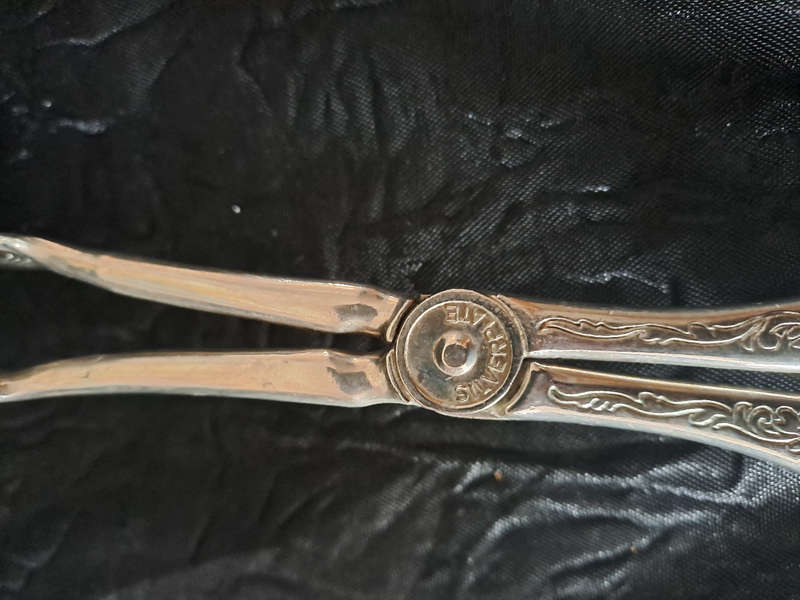 Silver plated Cake lifter, ice and sugar tongs etc.