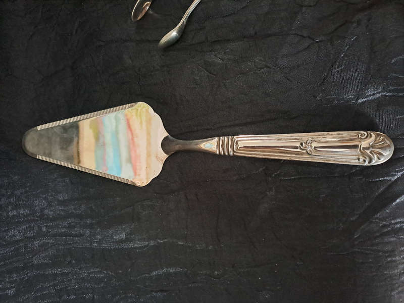 Silver plated Cake lifter, ice and sugar tongs etc.