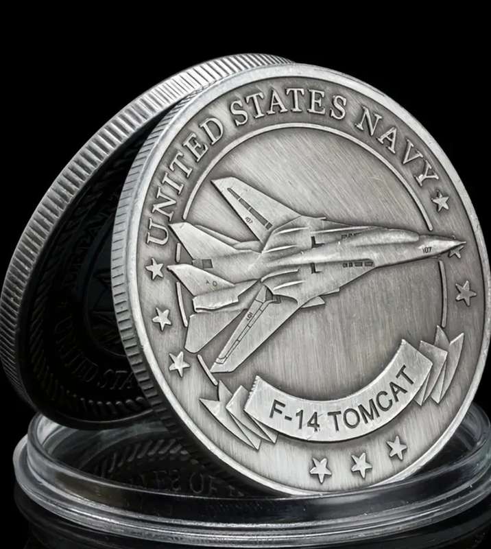 A Commemorative Coin Of The US Navy F-14 Tomcat Fighter Jet in Protective capsule.
