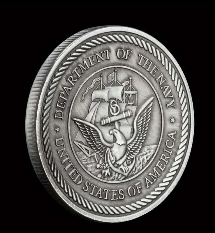A Commemorative Coin Of The US Navy F-14 Tomcat Fighter Jet in Protective capsule.