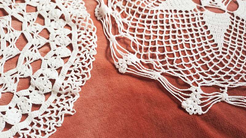 Two delicate crochet doilies - white - 18 and 23cm