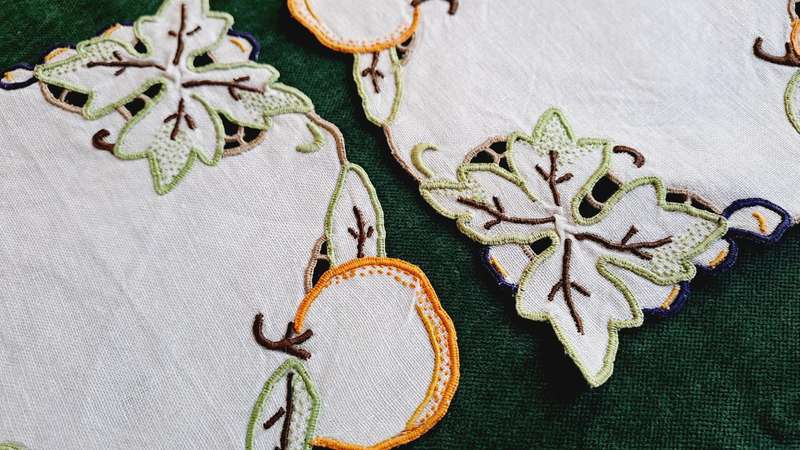 2 small embroidered mats 13cm x 13cm