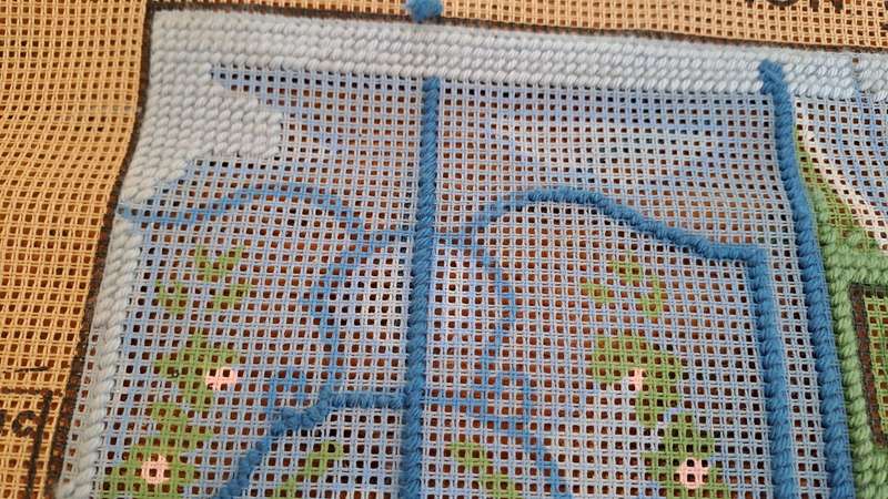 Tapestry canvas and a few yarns - partially completed- 30 x 40cm