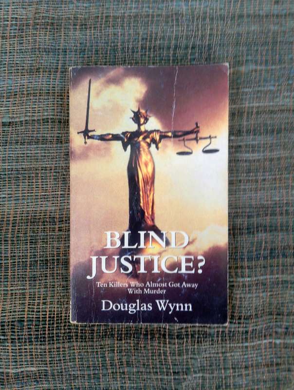 Blind Justice by Douglas Wynn