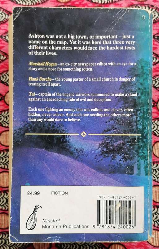 This Present Darkness by Frank Peretti