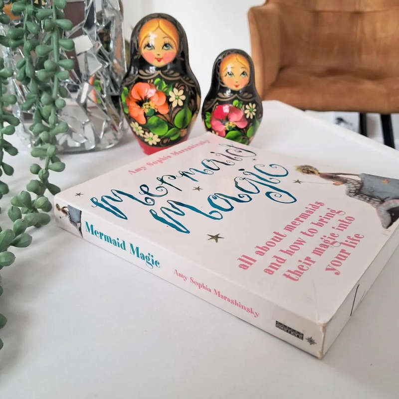 Mermaid Magic: All About Mermaids and How to Bring Their Magic into Your Life Paperback  by Amy Sop