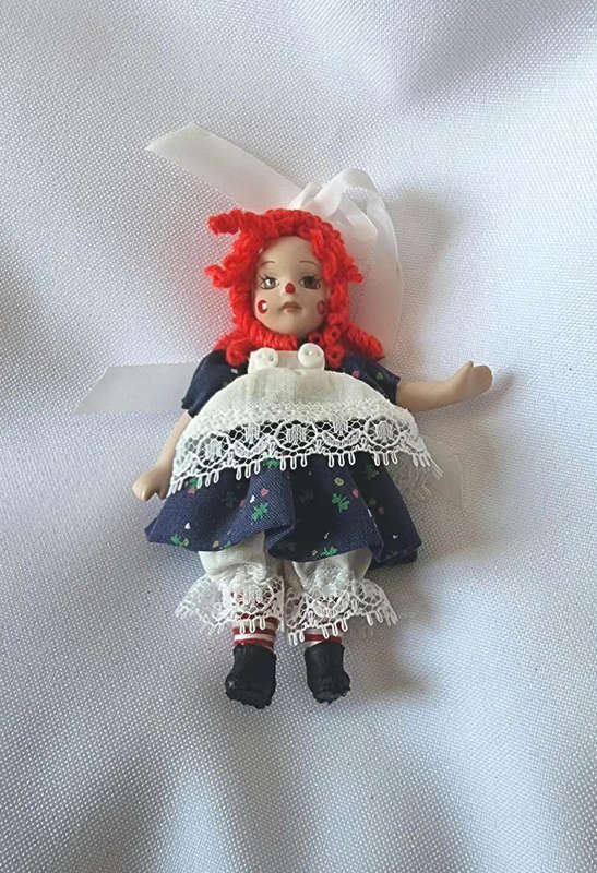 Raggedy Ann and Raggedy Andy Miniature Porcelain Dolls