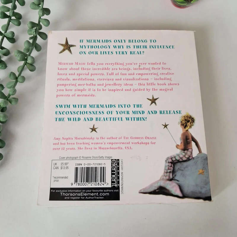 Mermaid Magic: All About Mermaids and How to Bring Their Magic into Your Life Paperback  by Amy Sop
