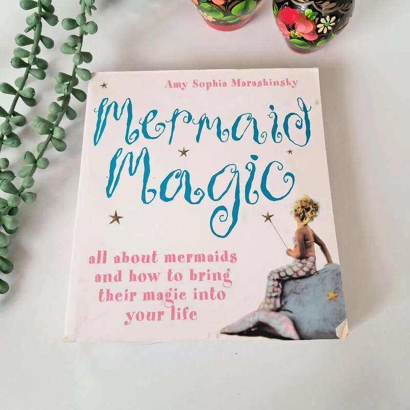 Mermaid Magic: All About Mermaids and How to Bring Their Magic into Your Life Paperback  by Amy Sop