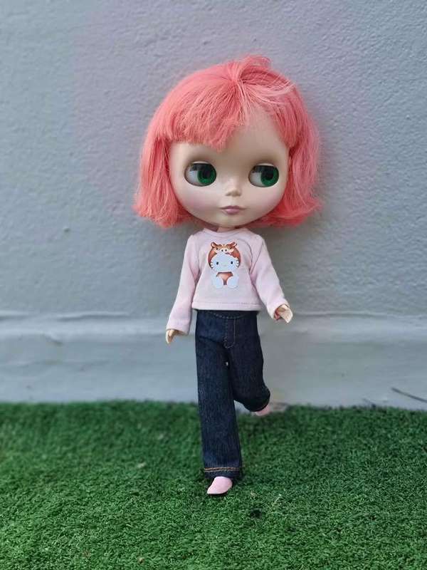 The Prima Dolly Peony Blythe doll is a cherished collectible, released in June 2008 as a CWC Limited