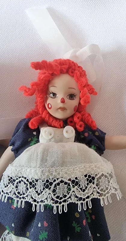 Raggedy Ann and Raggedy Andy Miniature Porcelain Dolls